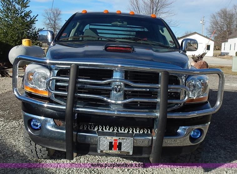 image for item L3583 2006 Dodge Ram 2500HD Quad Cab flatbed pickup truck