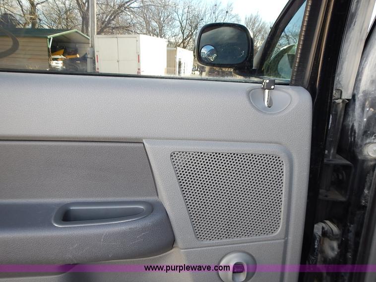 image for item L3583 2006 Dodge Ram 2500HD Quad Cab flatbed pickup truck