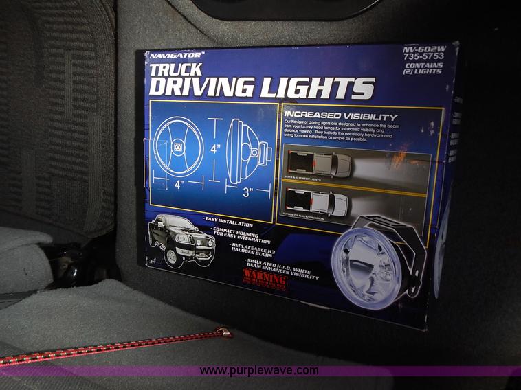 image for item L3583 2006 Dodge Ram 2500HD Quad Cab flatbed pickup truck