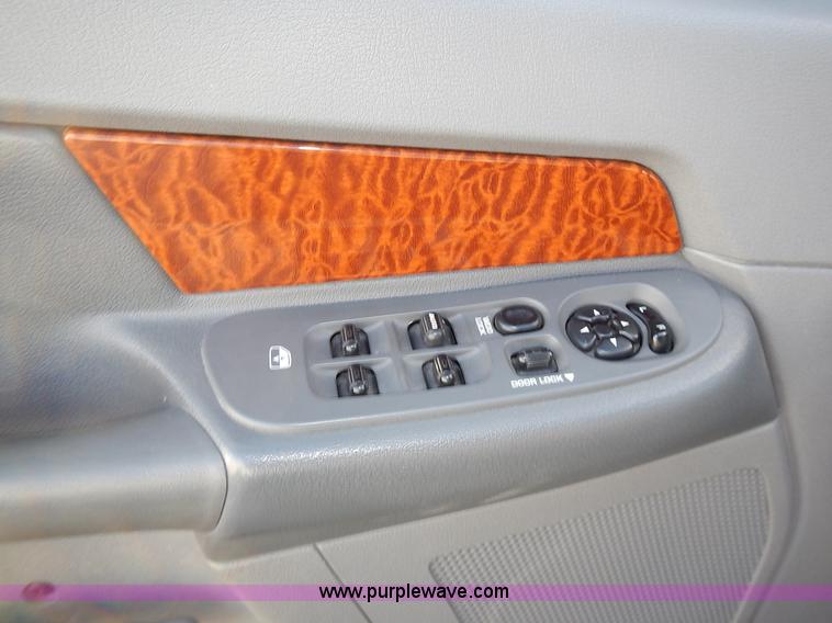 image for item L3583 2006 Dodge Ram 2500HD Quad Cab flatbed pickup truck