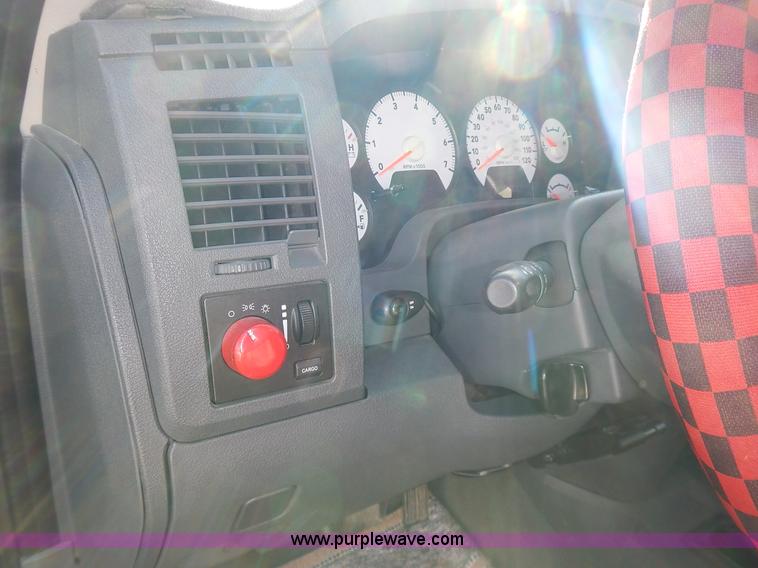 image for item L3583 2006 Dodge Ram 2500HD Quad Cab flatbed pickup truck