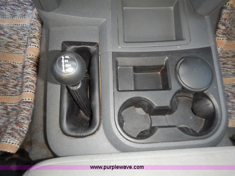 image for item L3583 2006 Dodge Ram 2500HD Quad Cab flatbed pickup truck