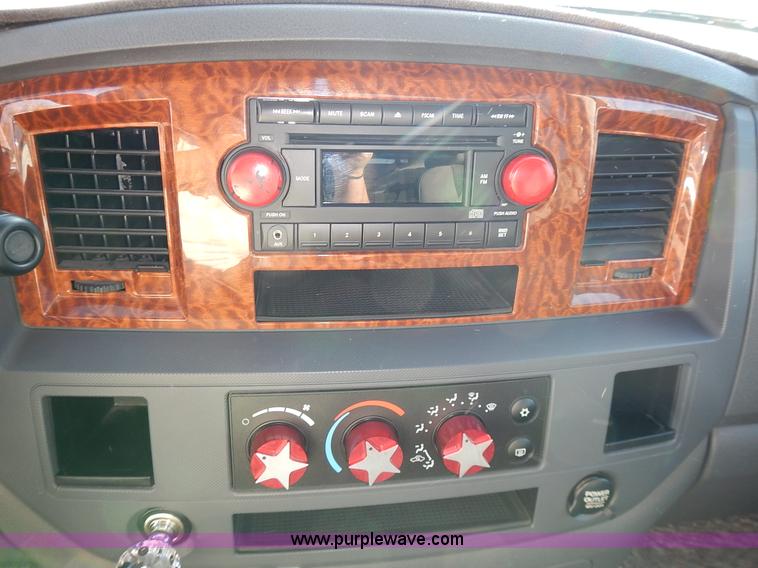 image for item L3583 2006 Dodge Ram 2500HD Quad Cab flatbed pickup truck