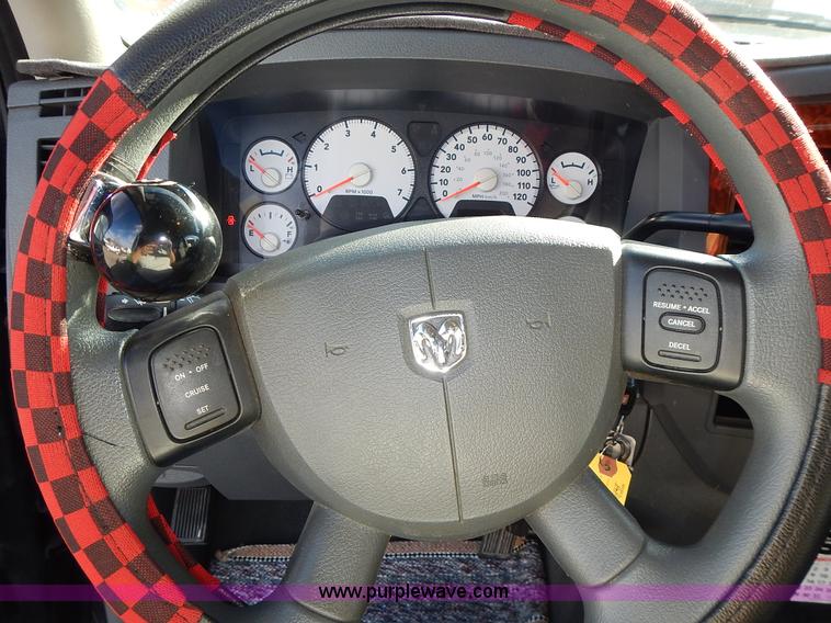 image for item L3583 2006 Dodge Ram 2500HD Quad Cab flatbed pickup truck