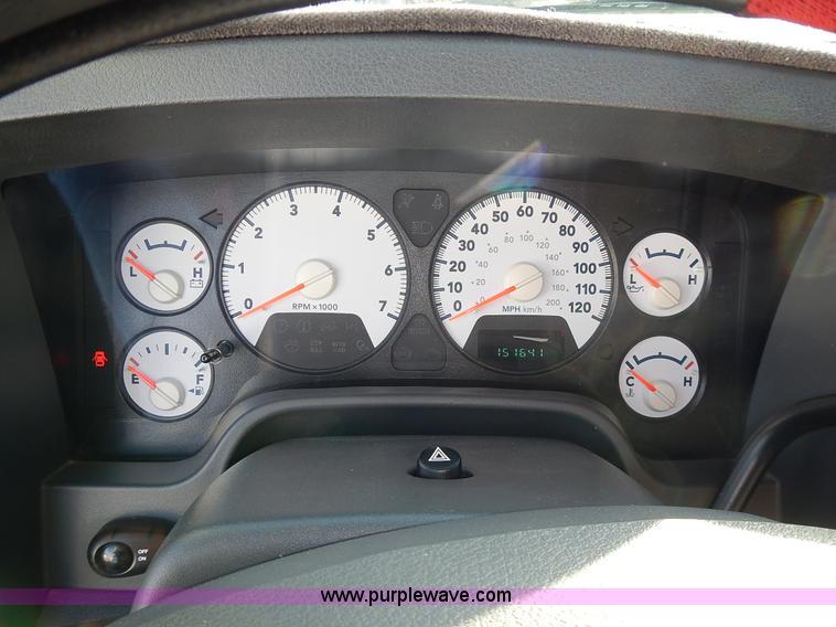 image for item L3583 2006 Dodge Ram 2500HD Quad Cab flatbed pickup truck