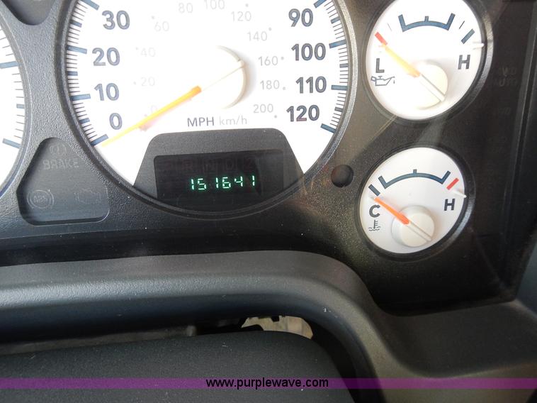 image for item L3583 2006 Dodge Ram 2500HD Quad Cab flatbed pickup truck