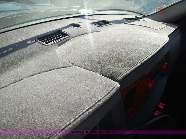 image for item L3583 2006 Dodge Ram 2500HD Quad Cab flatbed pickup truck