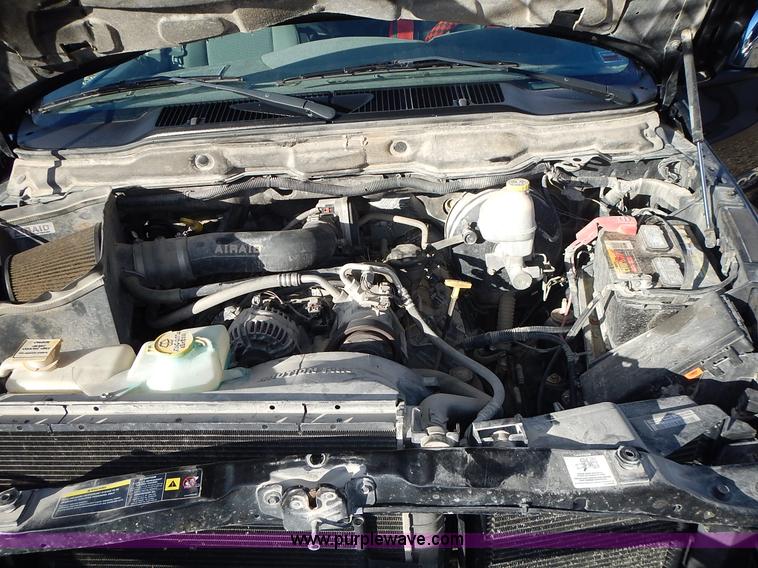 image for item L3583 2006 Dodge Ram 2500HD Quad Cab flatbed pickup truck