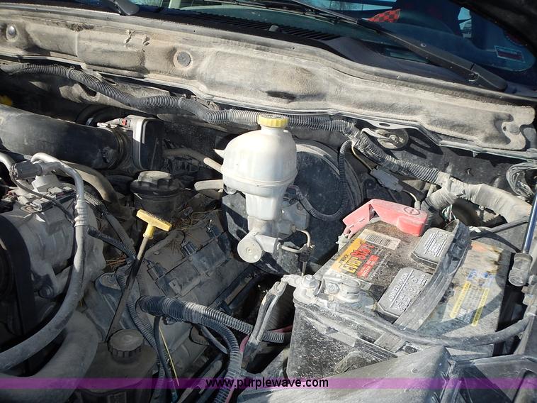 image for item L3583 2006 Dodge Ram 2500HD Quad Cab flatbed pickup truck