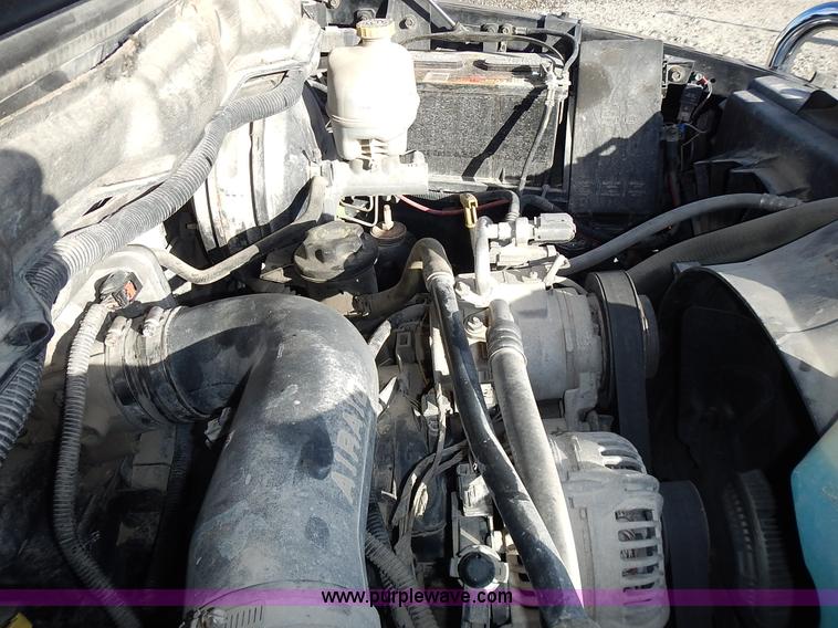 image for item L3583 2006 Dodge Ram 2500HD Quad Cab flatbed pickup truck