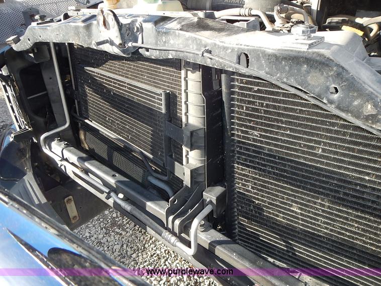 image for item L3583 2006 Dodge Ram 2500HD Quad Cab flatbed pickup truck