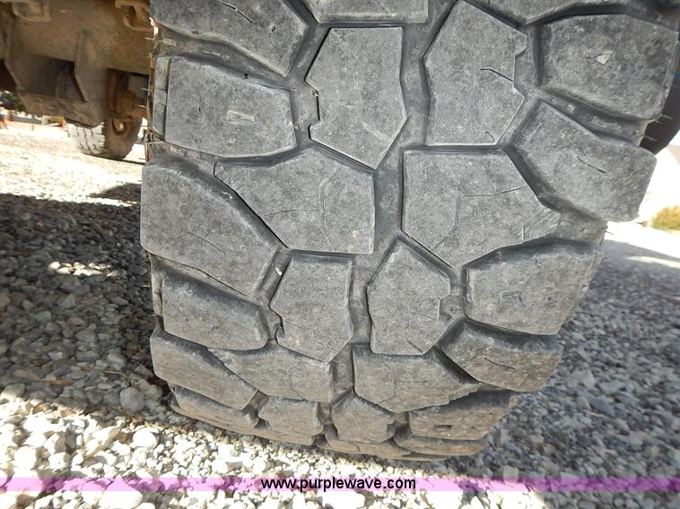 image for item L3583 2006 Dodge Ram 2500HD Quad Cab flatbed pickup truck