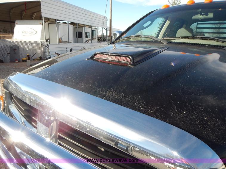 image for item L3583 2006 Dodge Ram 2500HD Quad Cab flatbed pickup truck