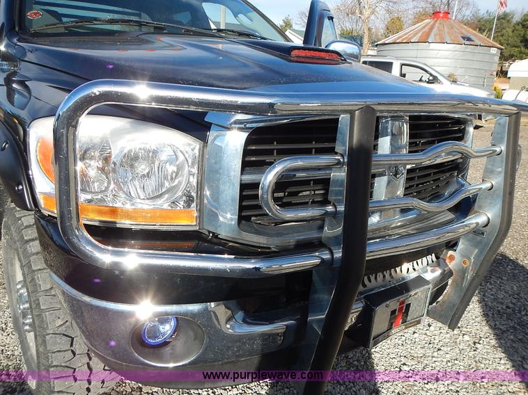 image for item L3583 2006 Dodge Ram 2500HD Quad Cab flatbed pickup truck