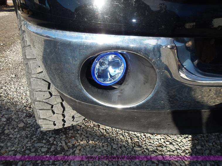 image for item L3583 2006 Dodge Ram 2500HD Quad Cab flatbed pickup truck