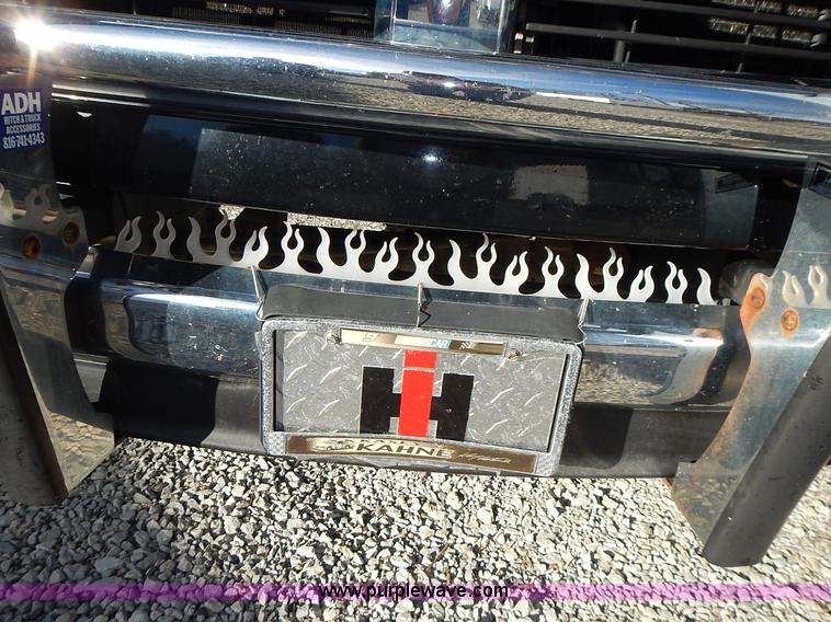 image for item L3583 2006 Dodge Ram 2500HD Quad Cab flatbed pickup truck