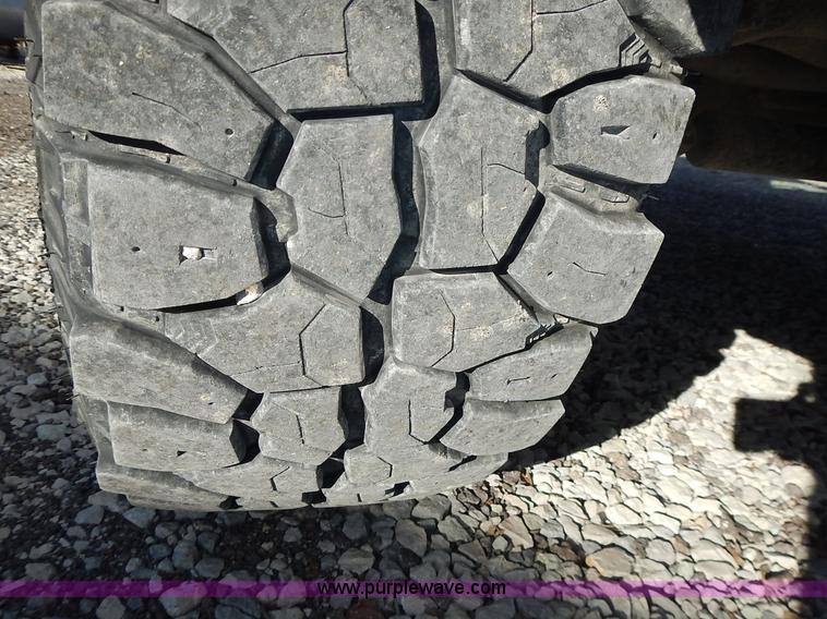 image for item L3583 2006 Dodge Ram 2500HD Quad Cab flatbed pickup truck