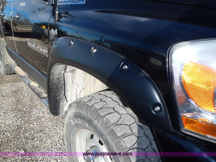 image for item L3583 2006 Dodge Ram 2500HD Quad Cab flatbed pickup truck