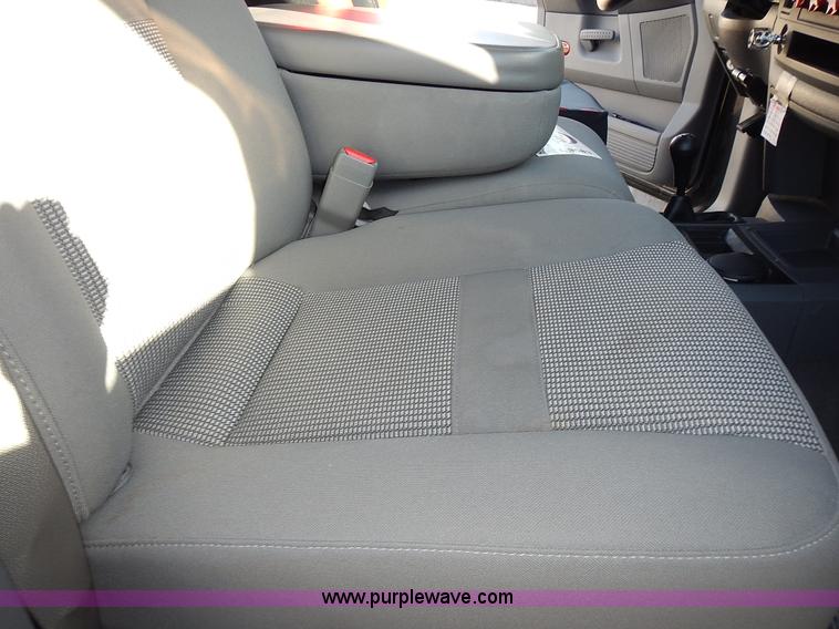 image for item L3583 2006 Dodge Ram 2500HD Quad Cab flatbed pickup truck