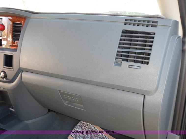 image for item L3583 2006 Dodge Ram 2500HD Quad Cab flatbed pickup truck