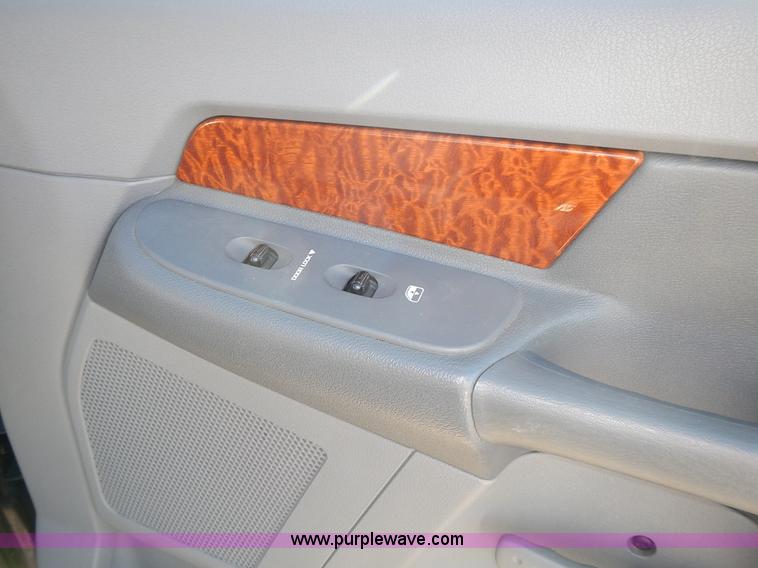 image for item L3583 2006 Dodge Ram 2500HD Quad Cab flatbed pickup truck