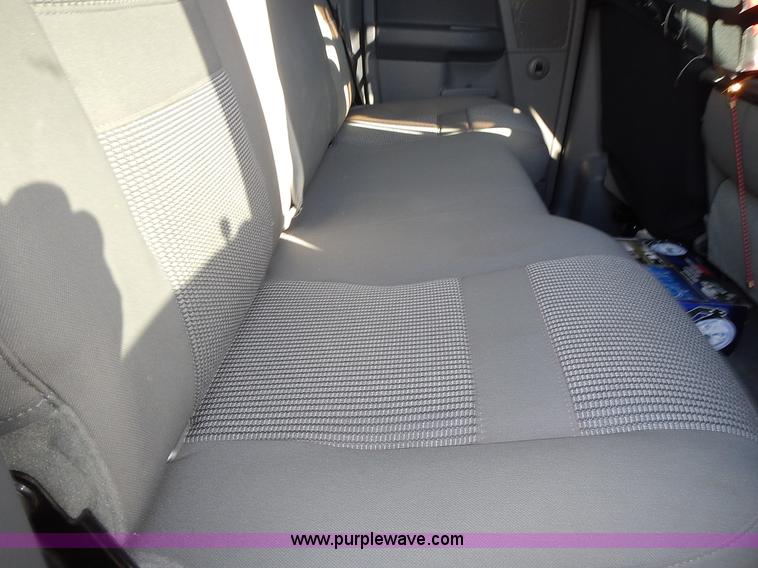 image for item L3583 2006 Dodge Ram 2500HD Quad Cab flatbed pickup truck