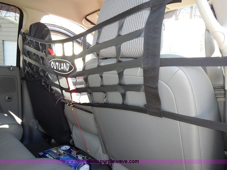 image for item L3583 2006 Dodge Ram 2500HD Quad Cab flatbed pickup truck