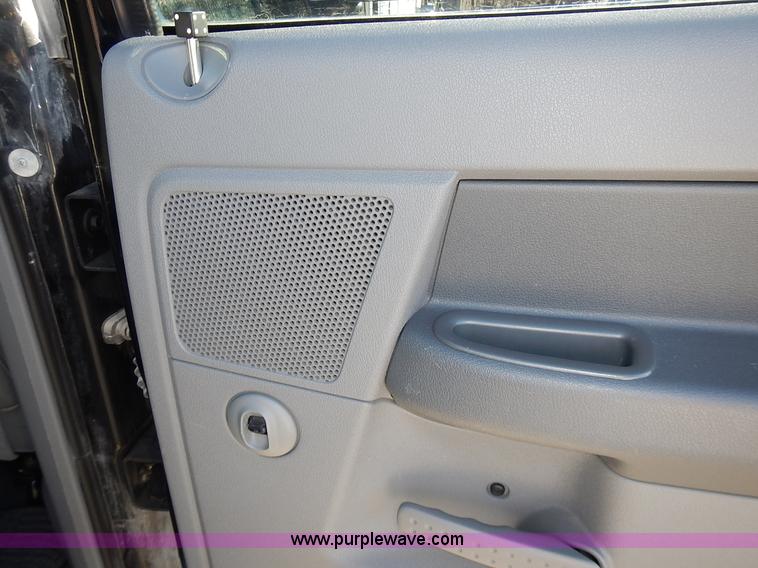 image for item L3583 2006 Dodge Ram 2500HD Quad Cab flatbed pickup truck