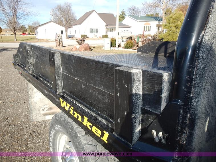 image for item L3583 2006 Dodge Ram 2500HD Quad Cab flatbed pickup truck