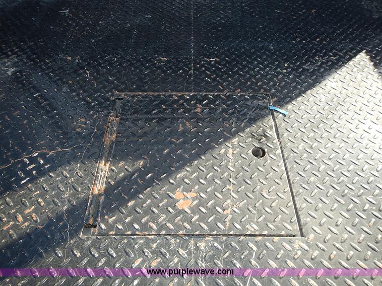 image for item L3583 2006 Dodge Ram 2500HD Quad Cab flatbed pickup truck