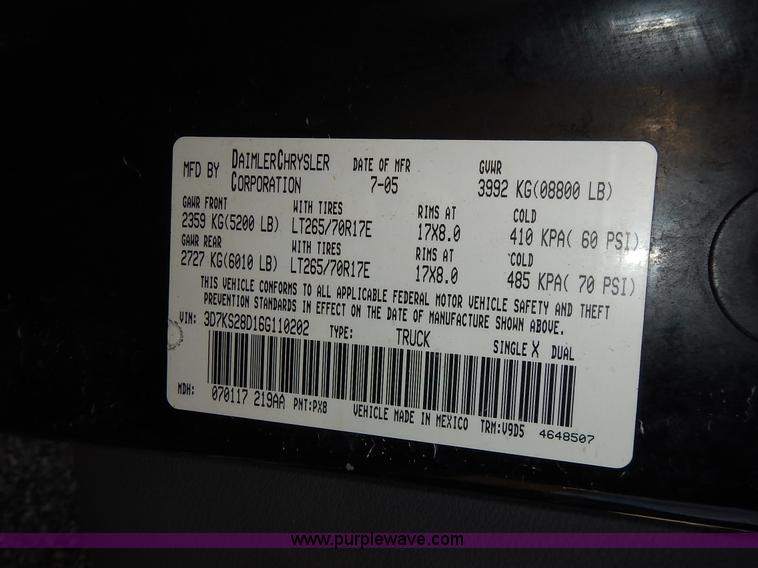 image for item L3583 2006 Dodge Ram 2500HD Quad Cab flatbed pickup truck