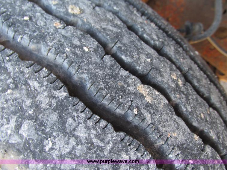 image for item L5359 2004 Ford F550 Super Duty dump flatbed truck