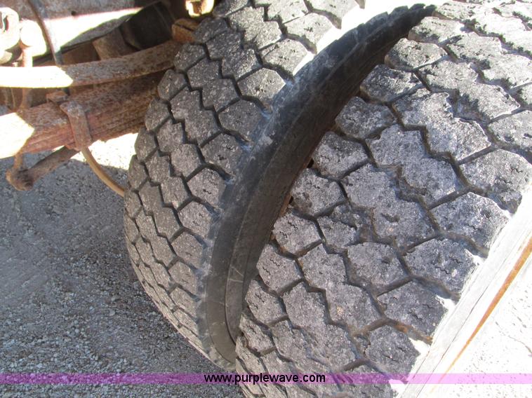 image for item L5359 2004 Ford F550 Super Duty dump flatbed truck