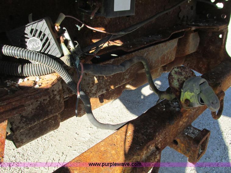 image for item L5359 2004 Ford F550 Super Duty dump flatbed truck