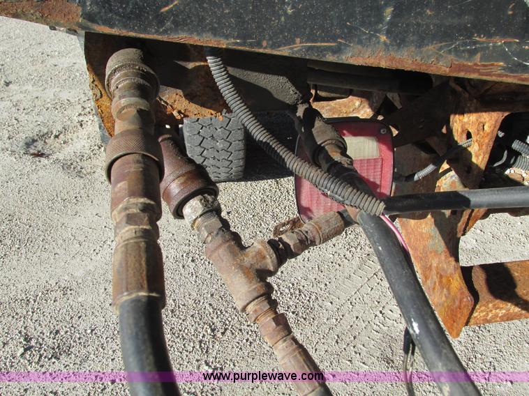 image for item L5359 2004 Ford F550 Super Duty dump flatbed truck