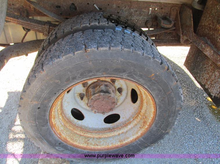 image for item L5359 2004 Ford F550 Super Duty dump flatbed truck