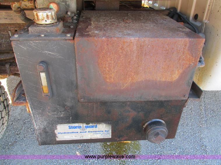 image for item L5359 2004 Ford F550 Super Duty dump flatbed truck