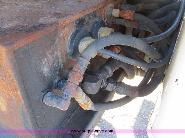 image for item L5359 2004 Ford F550 Super Duty dump flatbed truck