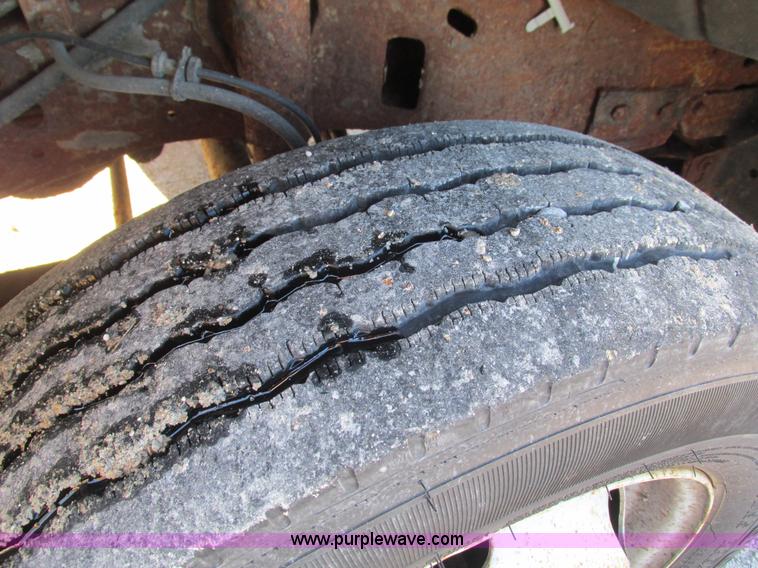 image for item L5359 2004 Ford F550 Super Duty dump flatbed truck