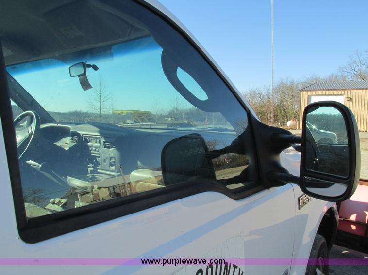 image for item L5359 2004 Ford F550 Super Duty dump flatbed truck