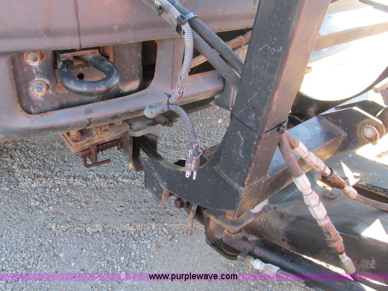 image for item L5359 2004 Ford F550 Super Duty dump flatbed truck