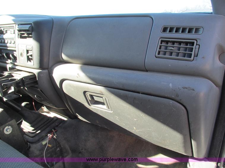 image for item L5359 2004 Ford F550 Super Duty dump flatbed truck