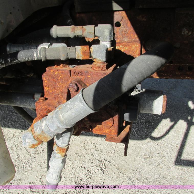 image for item L5360 2003 Ford F550 Super Duty dump flatbed truck