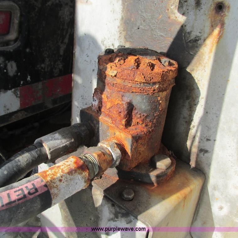 image for item L5360 2003 Ford F550 Super Duty dump flatbed truck