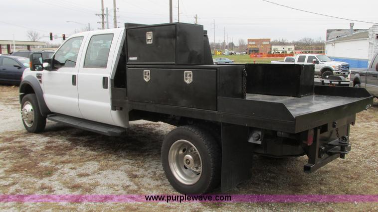 image for item N9328 2008 Ford F550 Crew Cab flatbed pickup truck