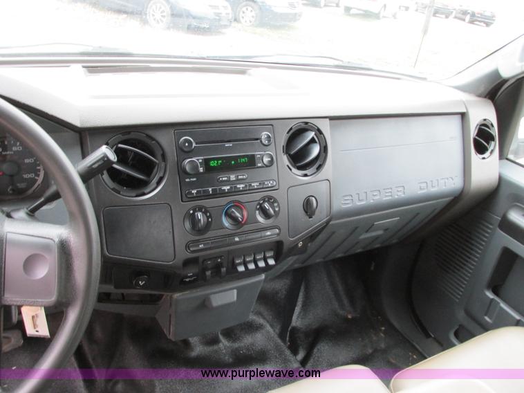 image for item N9328 2008 Ford F550 Crew Cab flatbed pickup truck