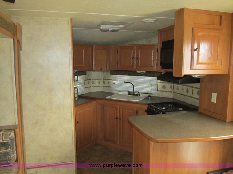 image for item N9338 2009 Keystone VR1323FKS camper