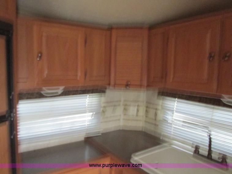 image for item N9338 2009 Keystone VR1323FKS camper