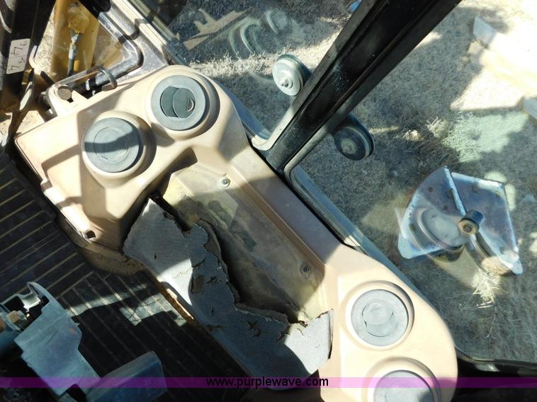 image for item AW9331 1997 John Deere 310SE backhoe