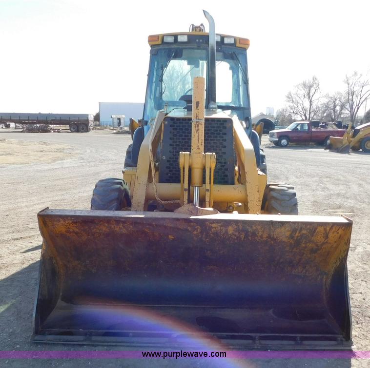 image for item AW9332 2000 John Deere 310SE backhoe
